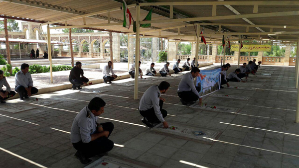 ادای احترام به مقام شامخ شهدا توسط پرسنل انتظامی شرکت فولاد زرند ایرانیان